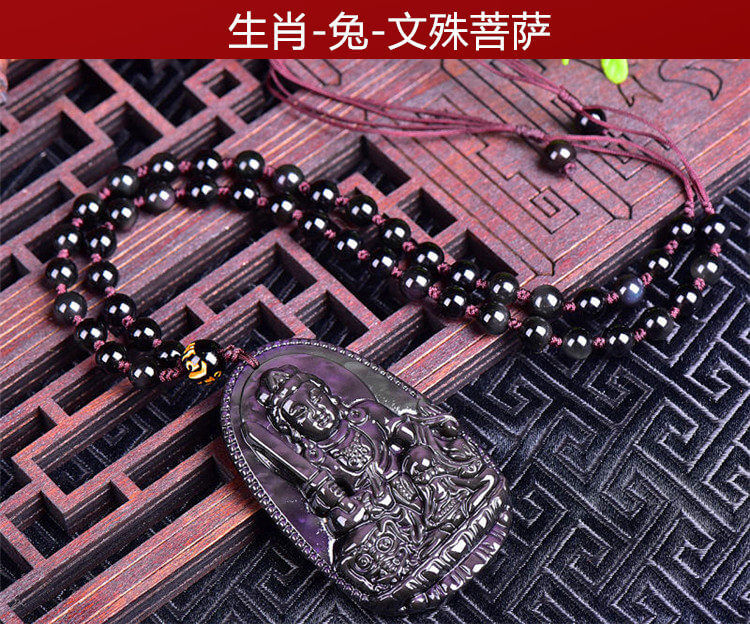 强光照射下的黑曜石本命佛
